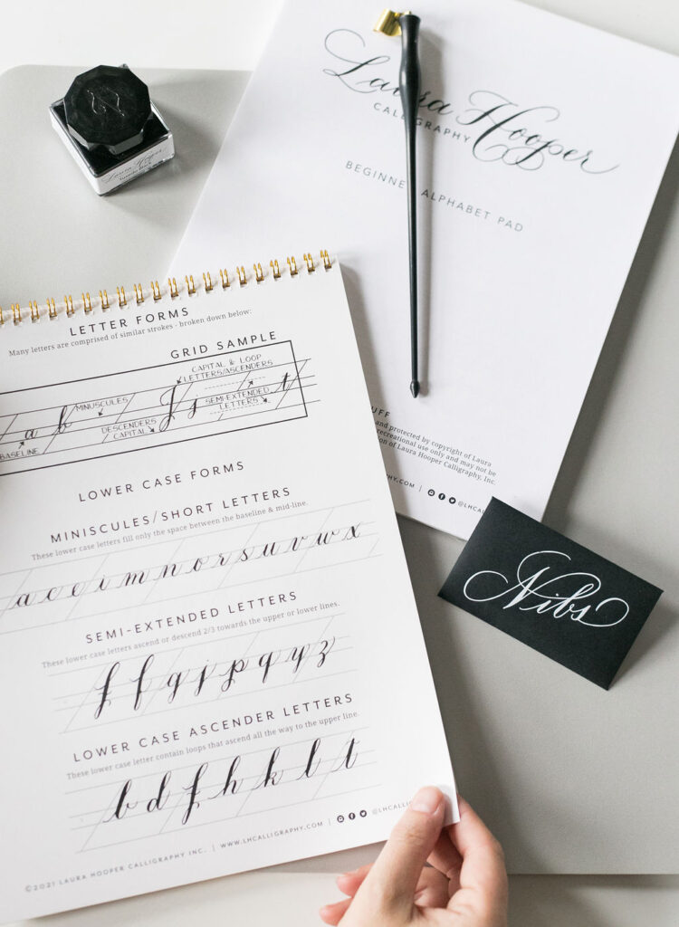 how to write calligraphy in a straight line practice book. Laura Hooper Design House.