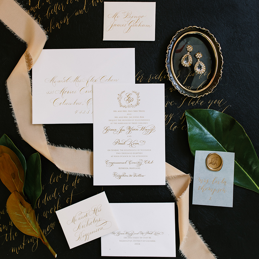 Ultra elegant, formal luxurious custom wedding invitation suite with extra thick card stock and personalized gold calligraphy & custom wedding monogram by expert stationery designer, Laura Hooper Design House.