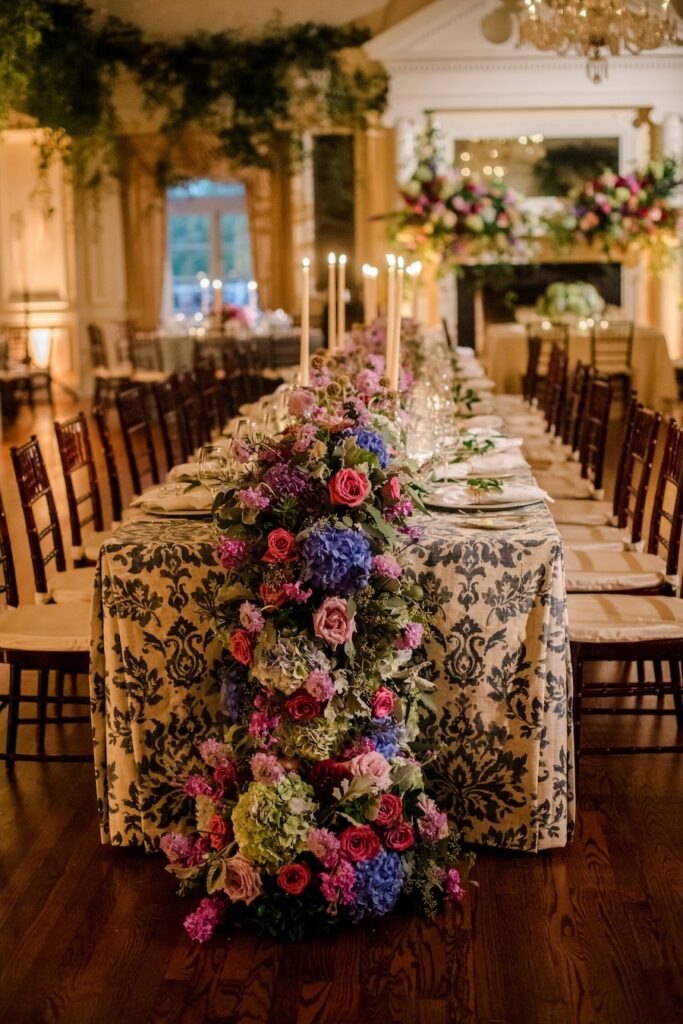 Lush floral table runner centerpiece, hydrangeas, pink, purple. patterned table linen. washington dc wedding. Laura Hooper Design House. 