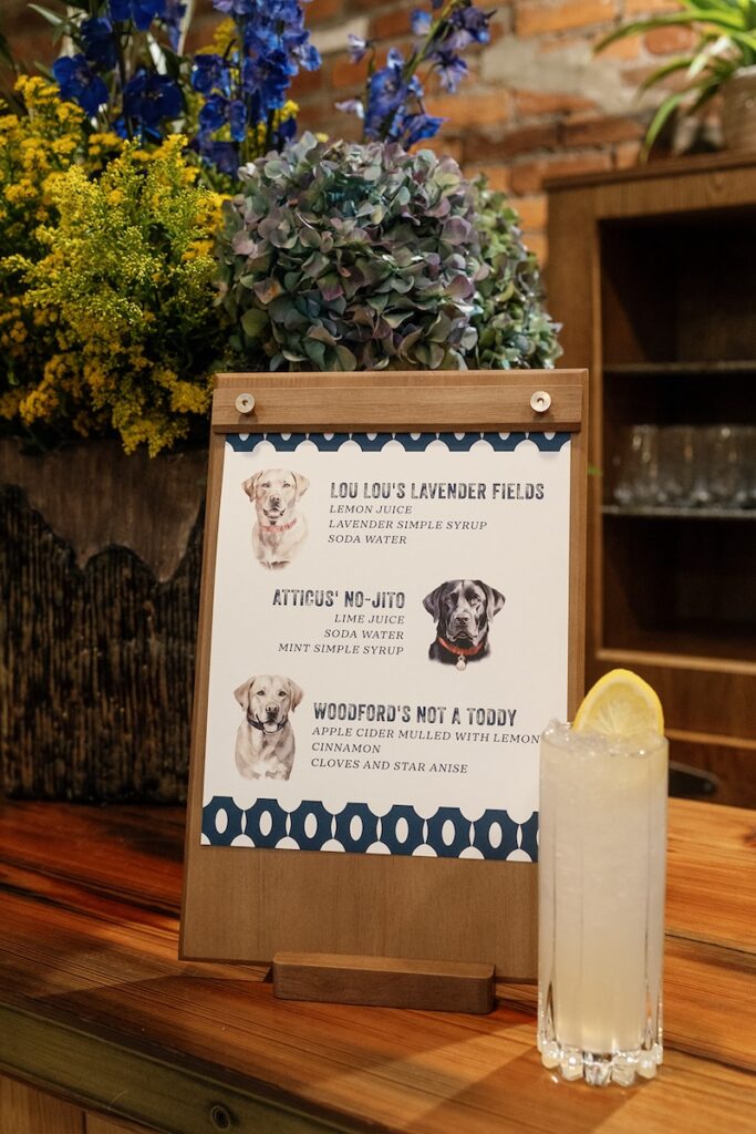 Signature drinks bar signage with family dogs portraits by Laura Hooper Design House. 