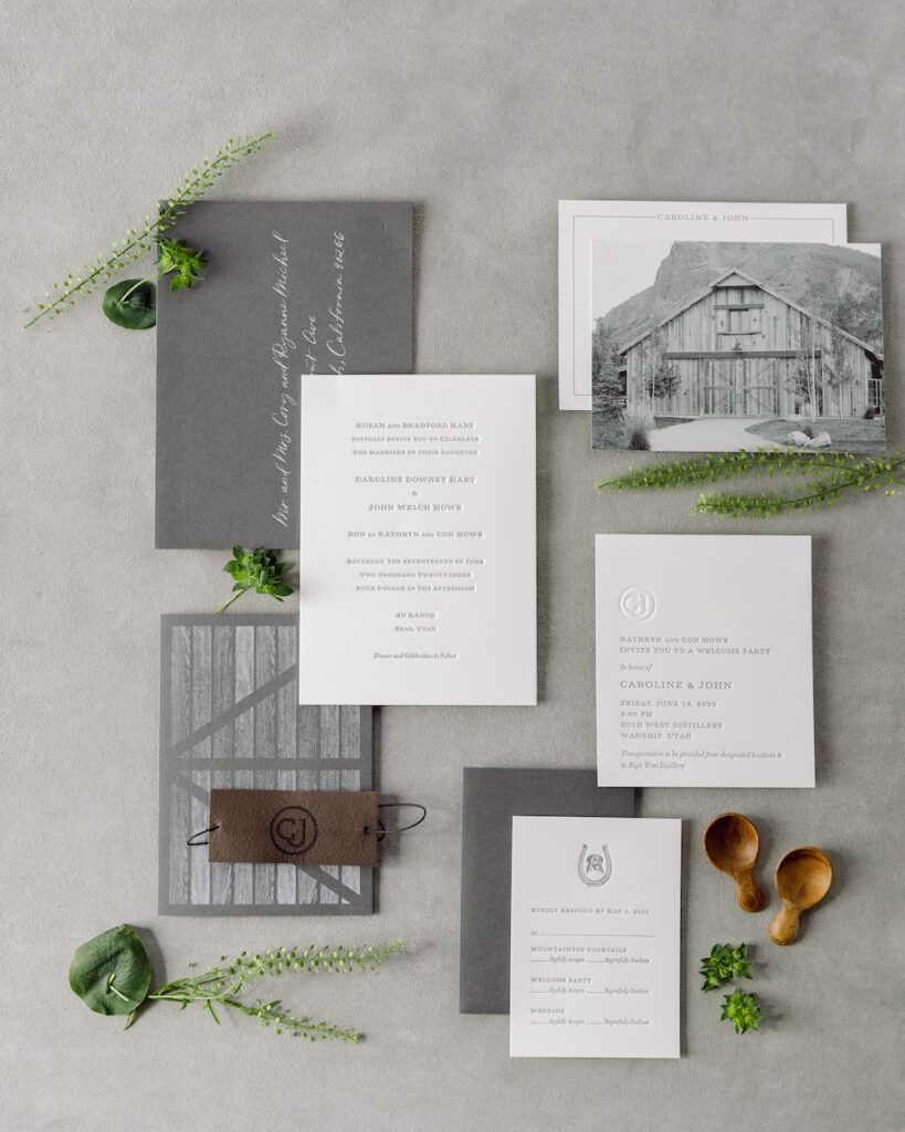Luxurious charcoal grey letterpress custom wedding invitation suite with white calligraphy, Laura Hooper Design House. 