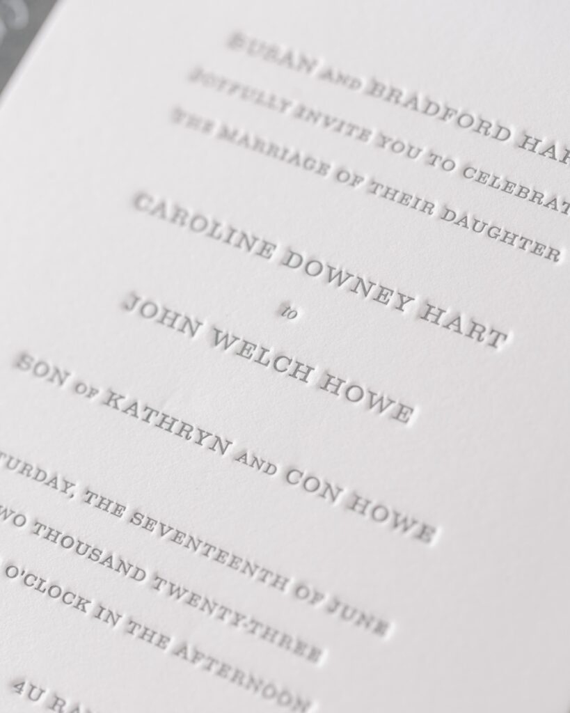 Custom white and grey letterpress wedding invitation with simple design, Laura Hooper Design House. 