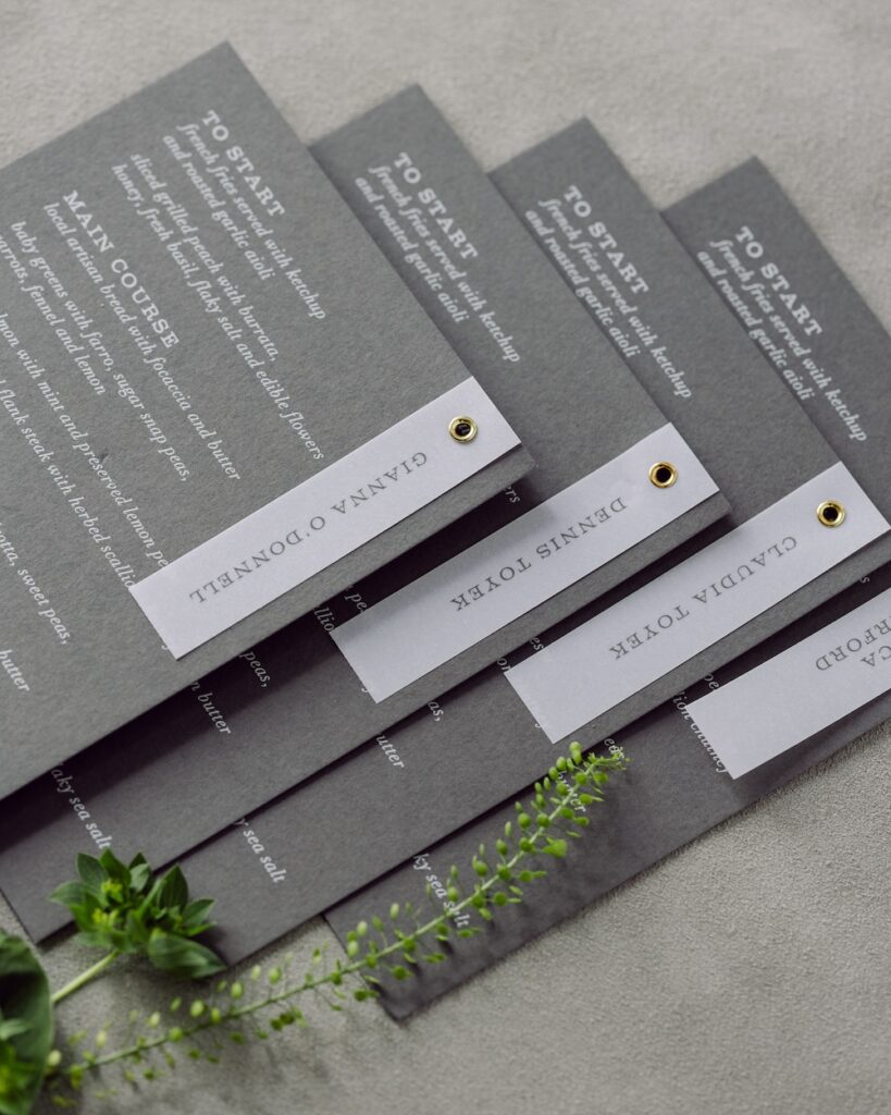 custom grey and white menu place cards, laura hooper design house. 