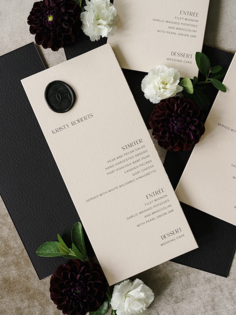 Modern elegant wedding menu with leather backing and custom wax seal. Custom wedding stationery & paper details. Laura Hooper Design House. 