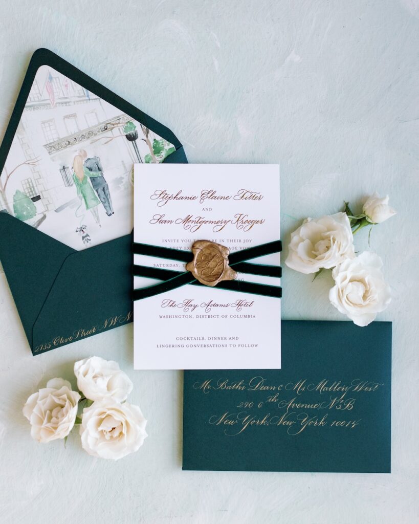 Custom wedding invitation with gold foil text, custom wax seal and green envelopes with gold calligraphy. Laura Hooper Design House. 