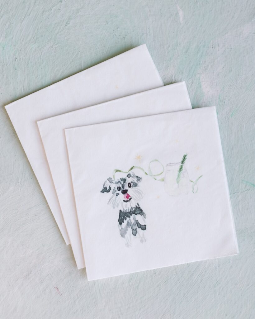 Custom cocktail napkins featuring painting of bride and groom's dog and signature drink. Laura Hooper Design House. 