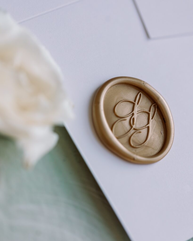 Custom monogram wax seal on wedding place cards. Laura Hooper Design House. 