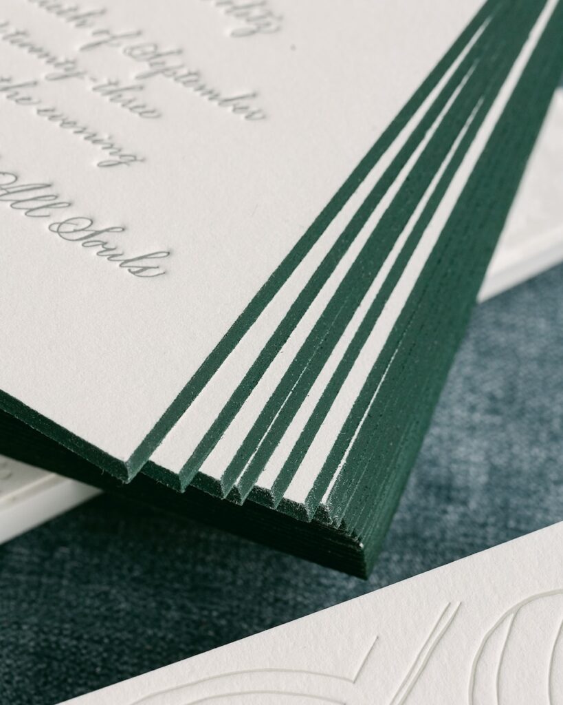 racing green beveled edge on custom 3 ply wedding invitation card. Laura Hooper Design House.