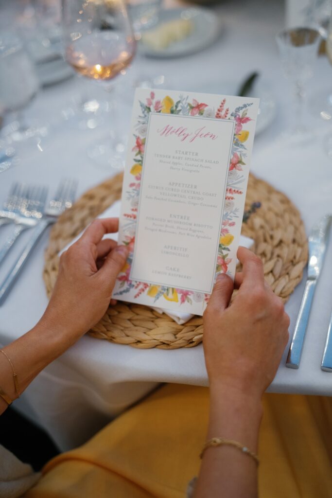 Custom watercolor floral border wedding menu, personalized place card. Laura Hooper Design House. 