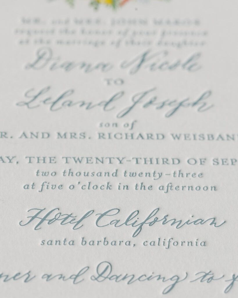 Custom letterpress wedding invitation suite with dusty blue text. Laura Hooper Design House.