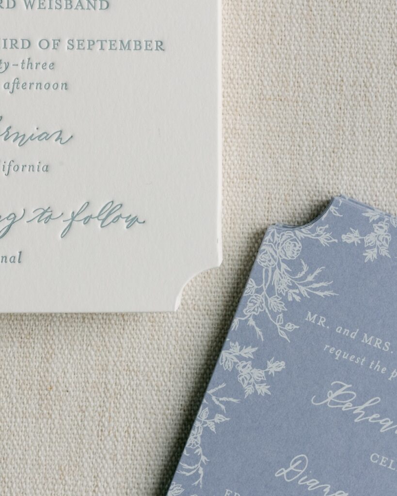 Custom die cut edge wedding invitation suite, dusty blue and white. Laura Hooper Design House.