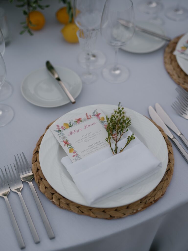 clean and modern wedding place setting with colorful watercolor floral menu place card. Laura Hooper Design House. 