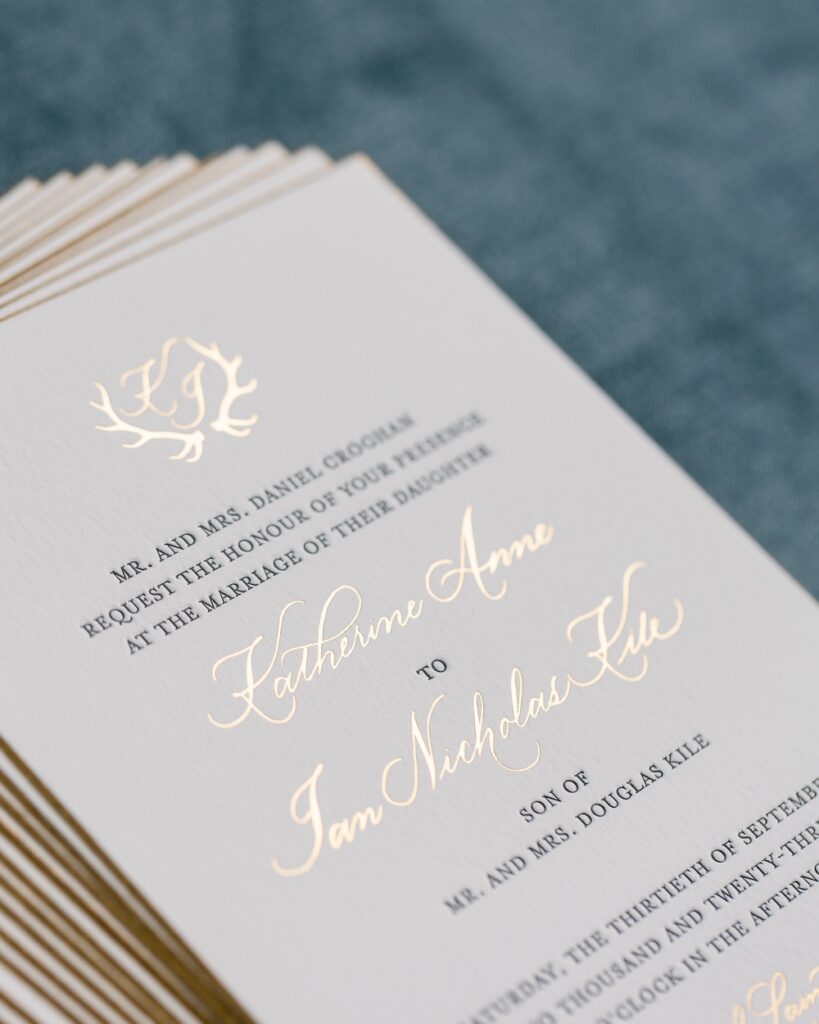 simple modern letterpress wedding invitation, gold edge, gold foil calligraphy. laura hooper design house