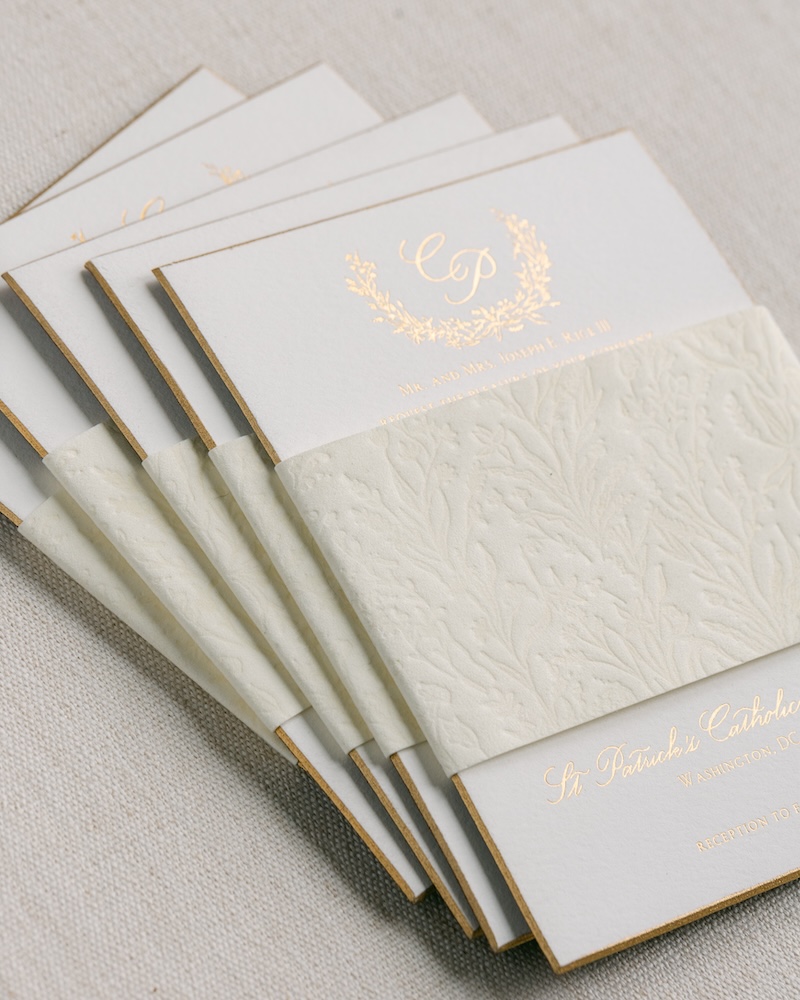 custom wedding invitation with gold foil printing, custom monogram, blind deboss belly band. laura hooper design house