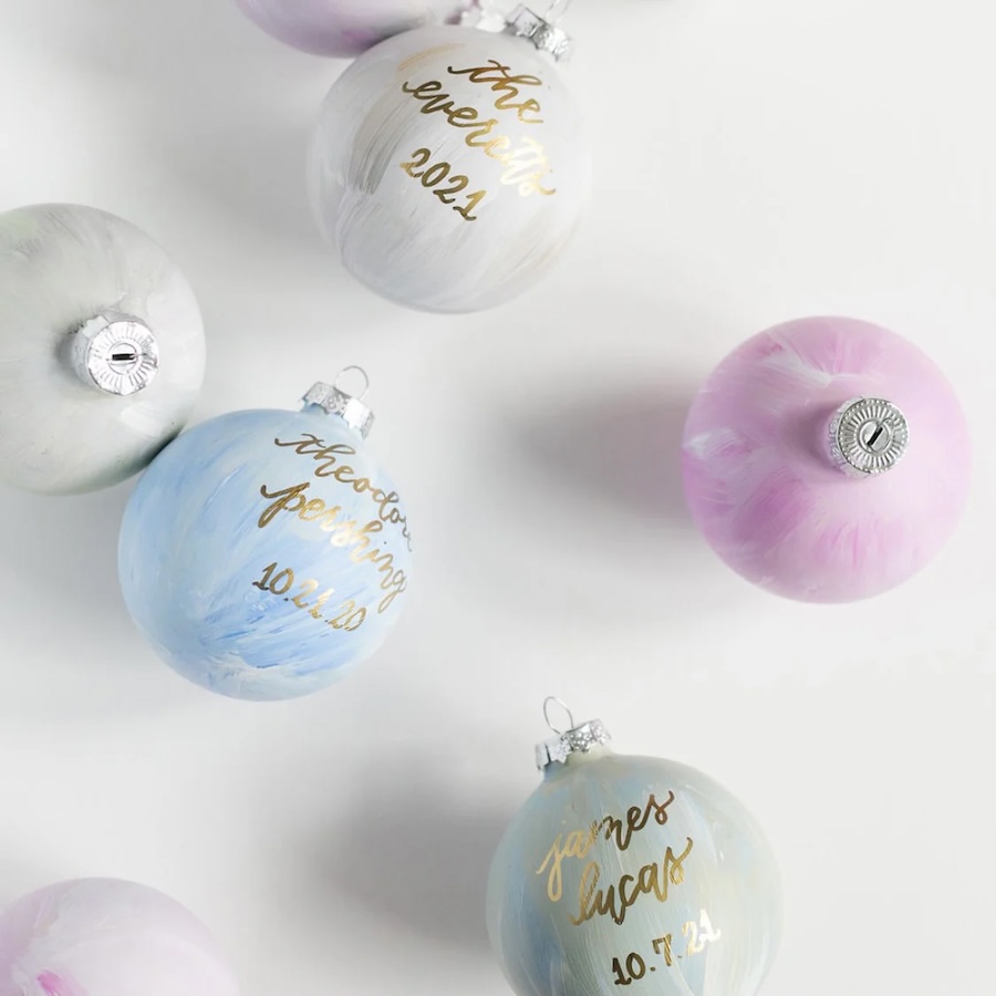 hand painted ceramic christmas ornaments with personalization. laura hooper design house